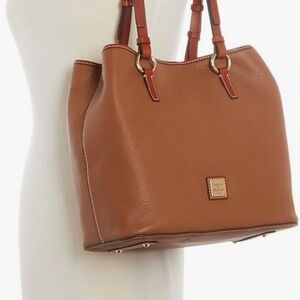 New. Never used. Dooney and Bourke Perry Satchel Natural leather color.